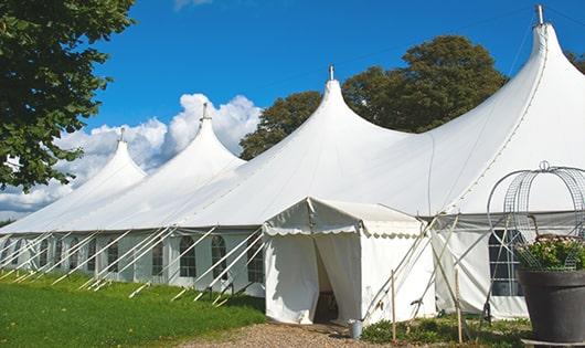 high-quality portable toilets stationed at a wedding, meeting the needs of guests throughout the outdoor reception in Clearfield